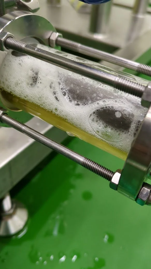 CO2 carbonation in line at Nagamine Seicha — fine mousse integrated into the Bodai-Sancha base liquor